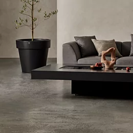 EcoSmart Fire Gin 90 Low fire table elevates a private residence patio with a sleek ethanol outdoor fire table and modern flame feature.