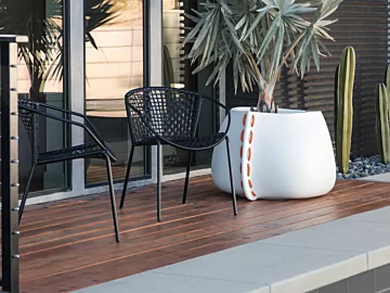 Blinde Design Stitch 50 Planter adds bone concrete outdoor planter elegance to Starfire garden deck, anchoring residential patio styling.